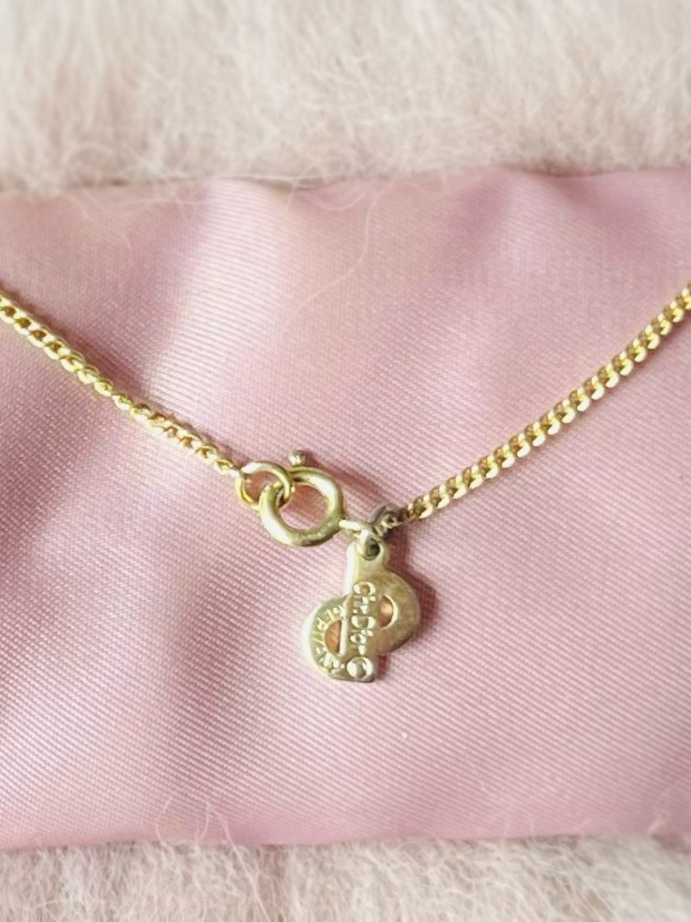 Like New Dior intricately designed gold necklace with renowned logo CD pendants